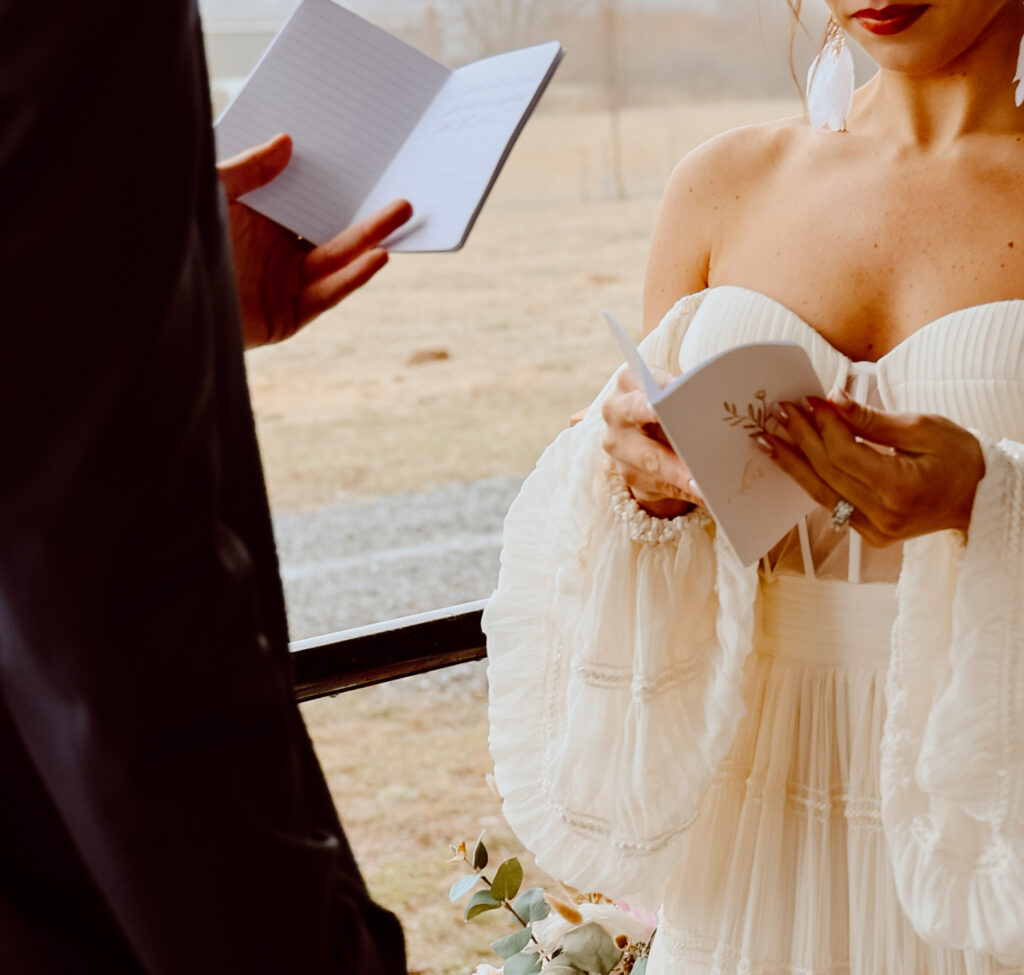 A couple reading their vows during their elopement ceremony in Pennsylvania.